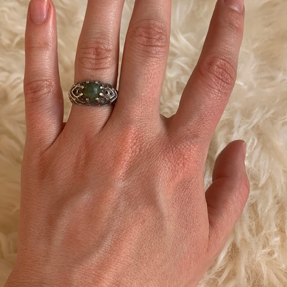 Silver ring with green stone